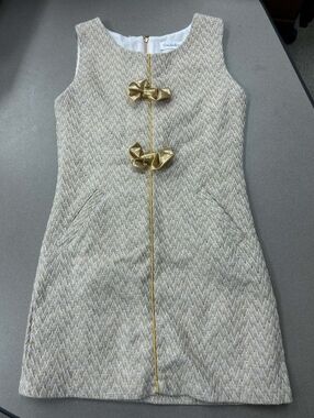 Evies Backyard Gold Bow Dress